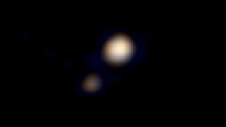 Our First Glimpse of Pluto And Charon In Color